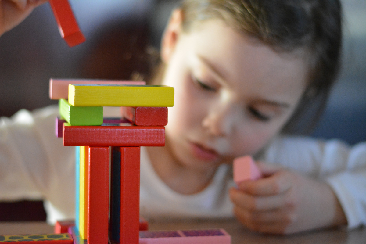 Girl Playing with Blocks